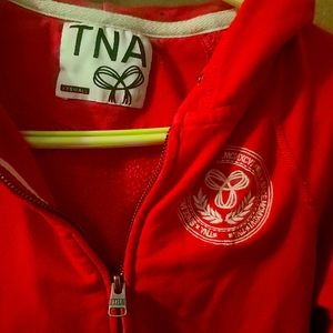 TNA zip up